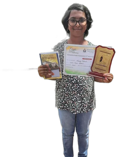 Ananya Vishwesh with her recitation-competition award