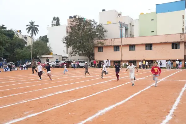 Learners sprinting down the lanes of the running track in Bengaluru