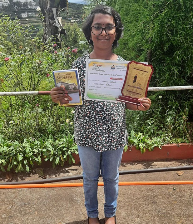 Ananya Vishwesh with her recitation-competition award