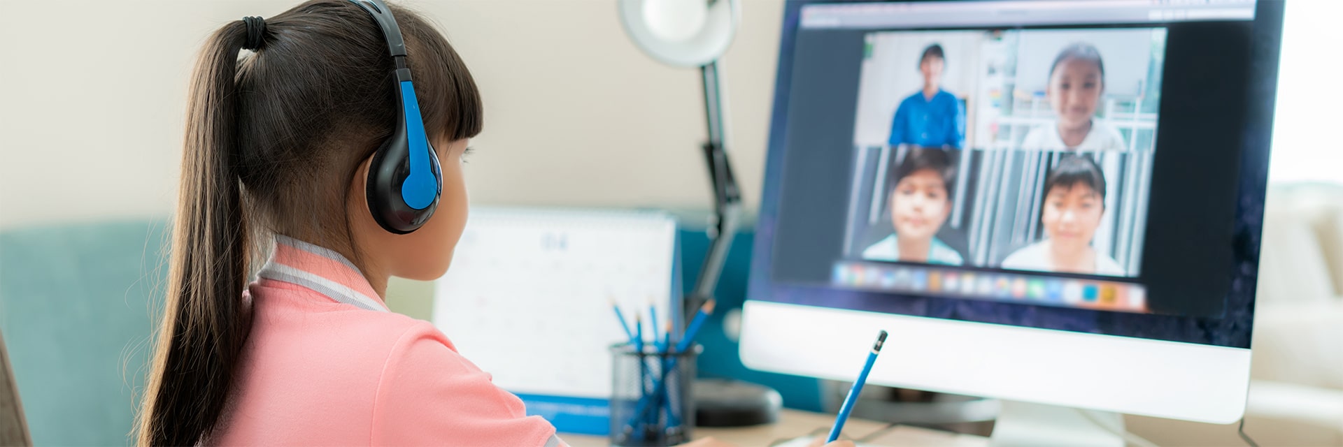 A 21K School learner in a live online class with her classmates
