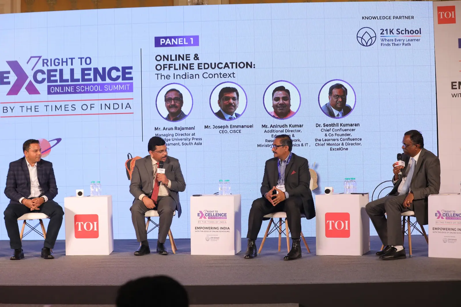 Four panellists on stage for the panel on online and offline education in the Indian context