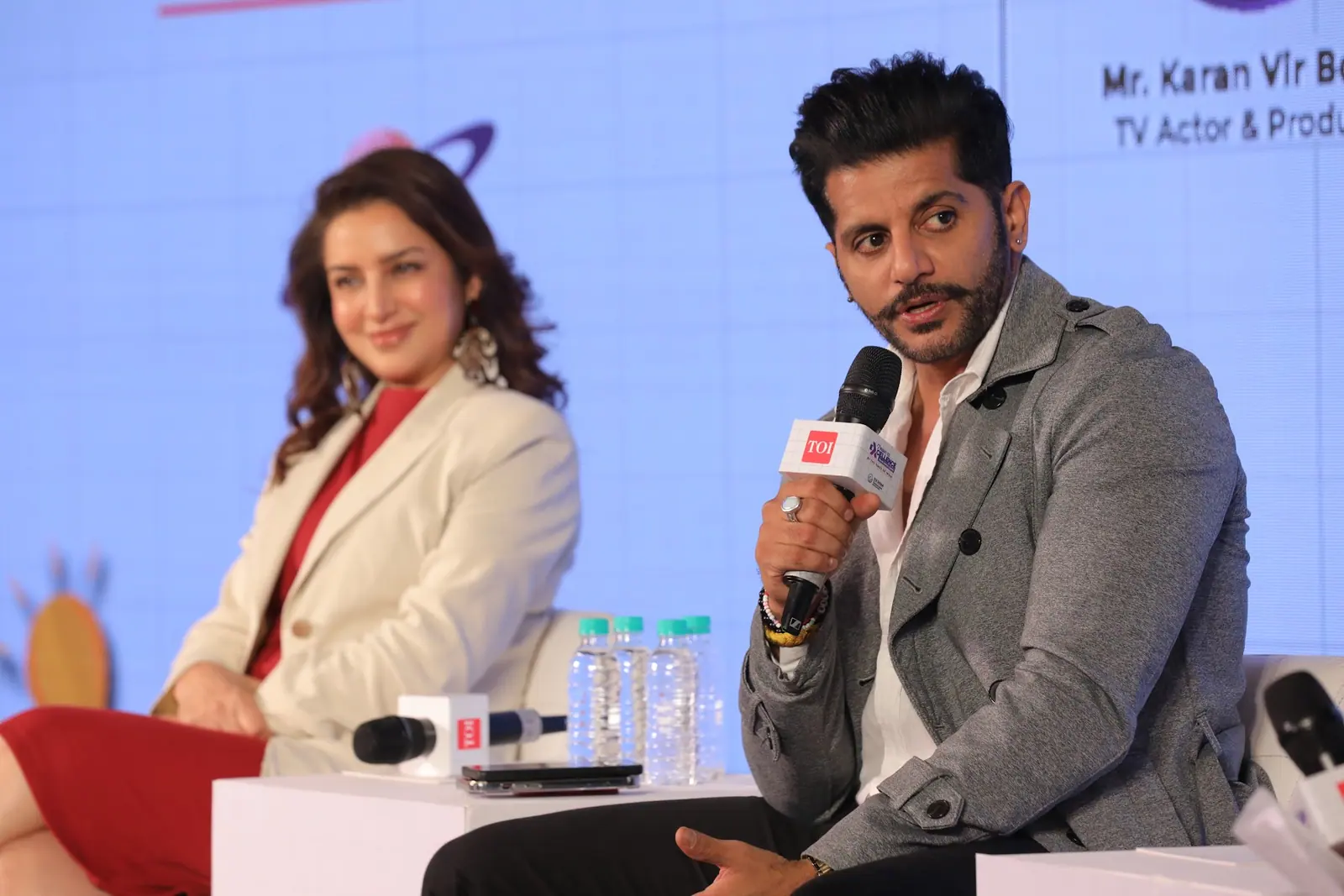 Tisca Chopra listens as Karanvir Bohra answers a question on stage